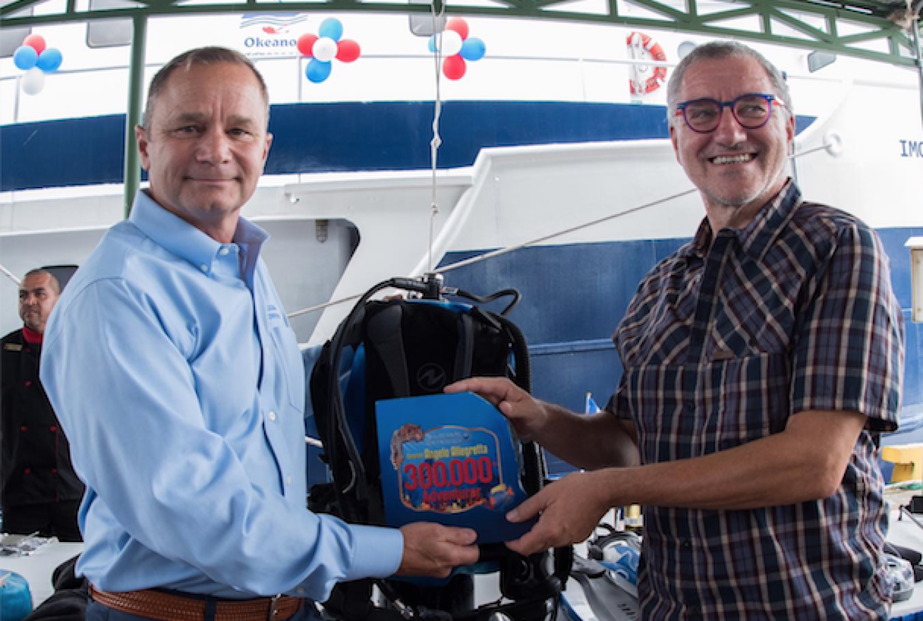 aggressor celebrates 300,000th traveler