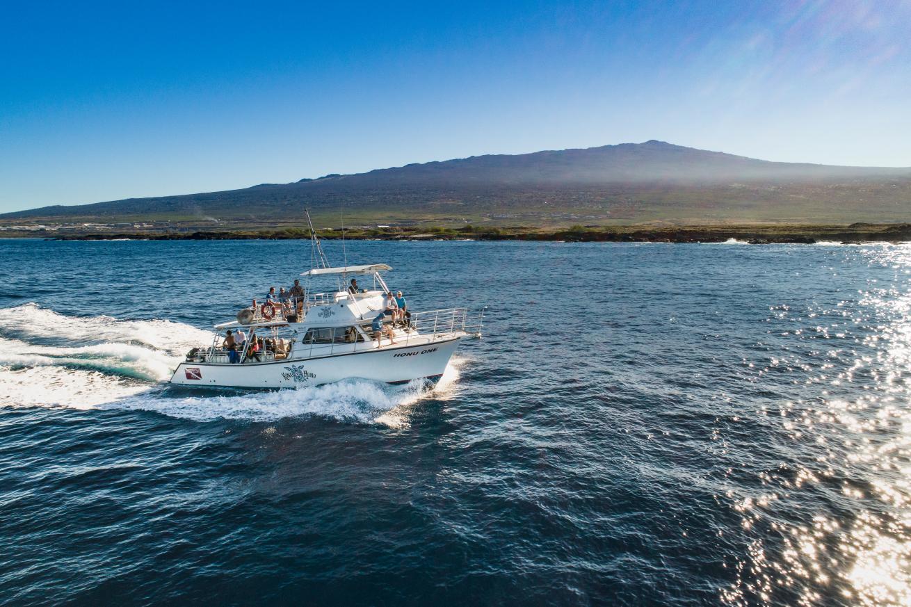 Boat in the ocean with divers.