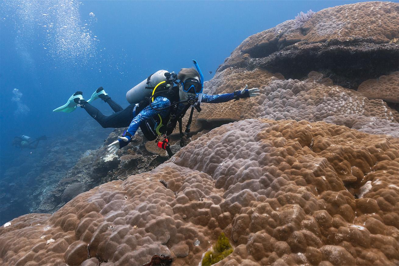 Candice's dive buddy, Stephen, wearing two Shearwater Peregrine dive computers